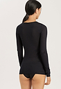 Back view of a women model wearing Hanro black cotton L/SLV Shirt