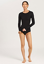 Full-body view of a women model wearing Hanro black cotton L/SLV Shirt