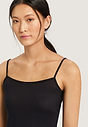 Close-up view of a women model wearing Hanro black cotton Spaghetti Top