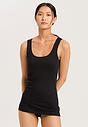 Front view of a women model wearing HA black cotton Tank Top