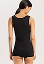 Back view of a women model wearing HA black cotton Tank Top