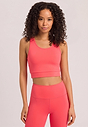 Front view of a women model wearing HA juicy melon microfibre Tank Top