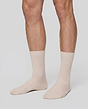 Front view of a women model wearing HA light linen wool Socks