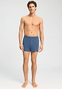 Full-body view of a men model wearing HA tanzanite melange modal/viscose/tencel Boxers
