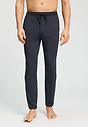Front view of a men model wearing HA charcoal melange modal/viscose/tencel Long Pants