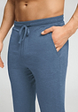 Close-up view of a men model wearing HA tanzanite melange modal/viscose/tencel Long Pants