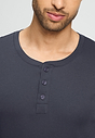 Close-up view of a men model wearing HA stormy gray cotton L/SLV Henley Shirt