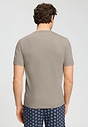 Back view of a men model wearing HA wooly beige cotton S/SLV Shirt