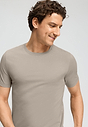 Close-up view of a men model wearing HA wooly beige cotton S/SLV Shirt