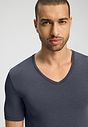 Close-up view of a men model wearing HA stormy gray modal/viscose/tencel S/SLV Shirt V-Neck