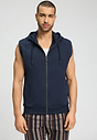 Front view of a men model wearing HA deep navy cotton Zippered vest