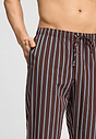 Close-up view of a men model wearing HA libra stripes cotton Long Pants