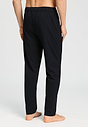 Back view of a men model wearing HA black cotton Long Pants