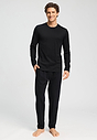 Full-body view of a men model wearing HA black cotton Long Pants