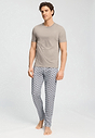 Full-body view of a men model wearing HA celestial light cotton Long Pants