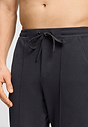 Close-up view of a men model wearing HA smokey charcoal cotton Long Pants