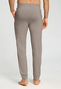 Back view of a men model wearing HA toffee melange modal/viscose/tencel Long Pants