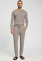Full-body view of a men model wearing HA toffee melange modal/viscose/tencel Long Pants