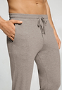 Close-up view of a men model wearing HA toffee melange modal/viscose/tencel Long Pants