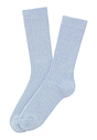 General view of a women model wearing HA chalky blue wool Socks