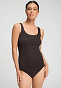 Front view of a women model wearing HA dark mocha cotton Tank Top