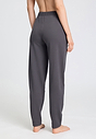 Back view of a women model wearing HA dark sesame cotton Long Pants