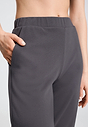 Close-up view of a women model wearing HA dark sesame cotton Long Pants
