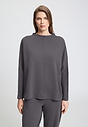 Front view of a women model wearing HA dark sesame cotton Pullover