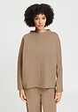 Front view of a women model wearing HA desert clay cotton Pullover