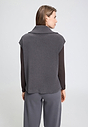 Back view of a women model wearing HA boulevard cotton Zippered vest