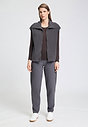 Full-body view of a women model wearing HA boulevard cotton Zippered vest