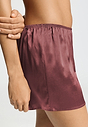 Close-up view of a women model wearing HA apple butter silk Knickers