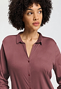 Close-up view of a women model wearing HA apple butter modal/viscose/tencel L/SLV Shirt