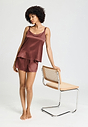 Full-body view of a women model wearing HA apple butter silk Spaghetti Top