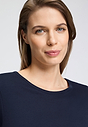 Close-up view of a women model wearing HA deep navy cotton L/SLV Shirt