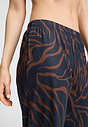 Close-up view of a women model wearing HA navy wildness cotton Long Pants