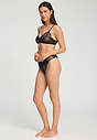 Full-body view of a women model wearing HA black microfibre Soft Cup Bra