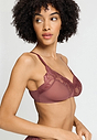 Close-up view of a women model wearing HA apple butter microfibre Soft Cup Bra