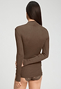Back view of a women model wearing HA natural teak wool Turtle-Neck Shirt