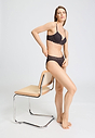 Full-body view of a women model wearing HA dark mocha cotton Mini Briefs