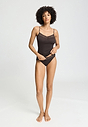 Full-body view of a women model wearing HA dark mocha cotton Spaghetti Top