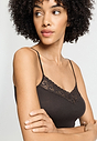 Close-up view of a women model wearing HA dark mocha cotton Spaghetti Top