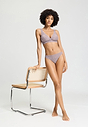 Full-body view of a women model wearing HA stormy rose microfibre Thong