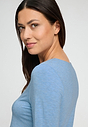 Close-up view of a women model wearing HA bluebird melange modal/viscose/tencel L/SLV Pajama