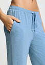 Close-up view of a women model wearing HA bluebird melange modal/viscose/tencel Long Pants