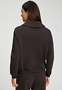 Back view of a women model wearing HA dark mocha cotton Cardigan