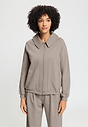 Front view of a women model wearing HA rose grey cotton Cardigan