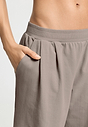 Close-up view of a women model wearing HA rose grey cotton Long Pants