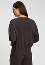 Back view of a women model wearing HA dark mocha cotton Sweatshirt