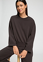 Close-up view of a women model wearing HA dark mocha cotton Sweatshirt